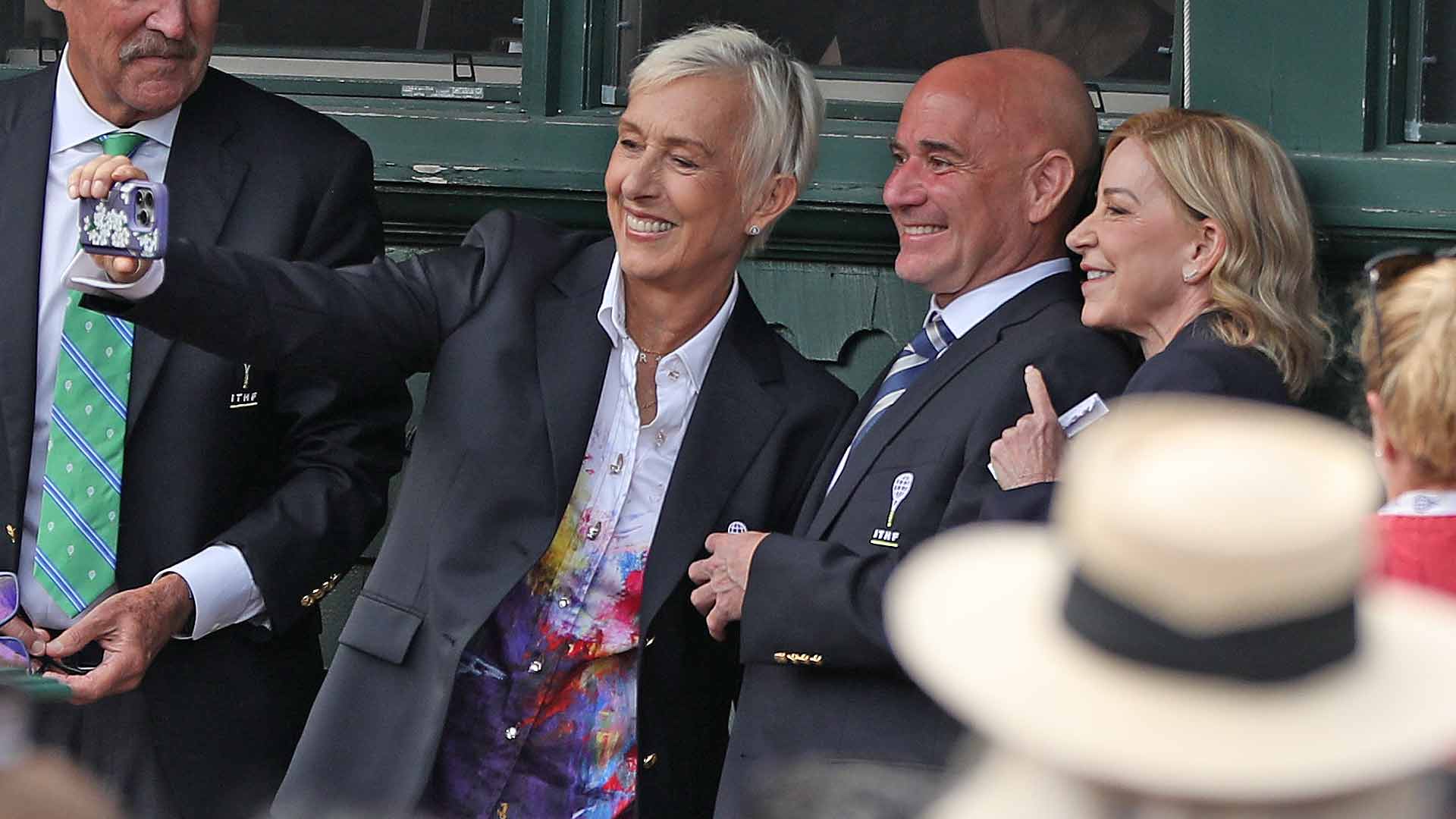 Martina Navratilova, Andre Agassi and Chris Evert pose for a selfie ahead of the International Tennis Hall of Fame induction ceremony.