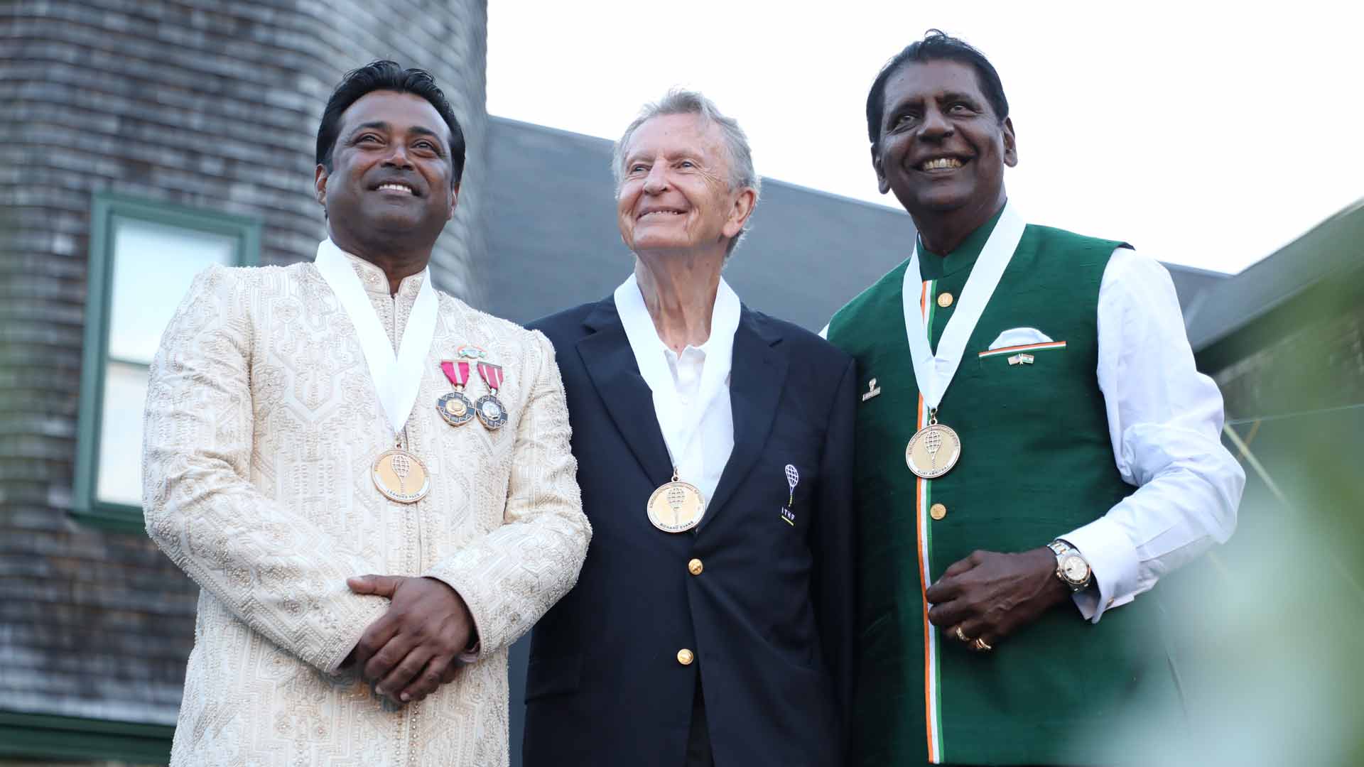 Leander Paes, Richard Evans and Vijay Amritraj at the International Tennis Hall of Fame induction ceremony.